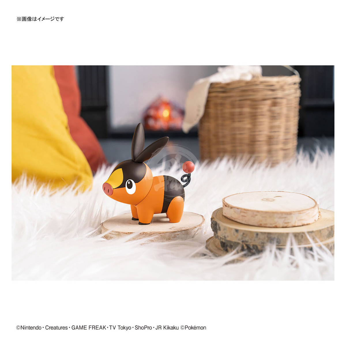 Bandai Pokepla Quick 14 Tepig model kit with detailed plastic figure and vibrant orange and brown coloring.