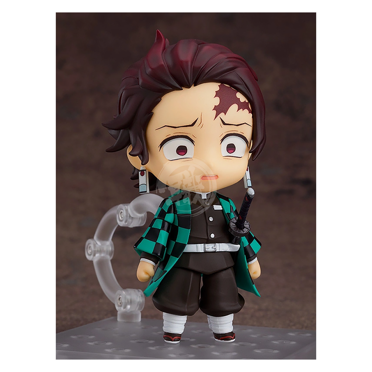 Nendoroid Tanjiro Kamado figure from Good Smile Company, featuring detailed chibi-style character with green and black checkered haori.