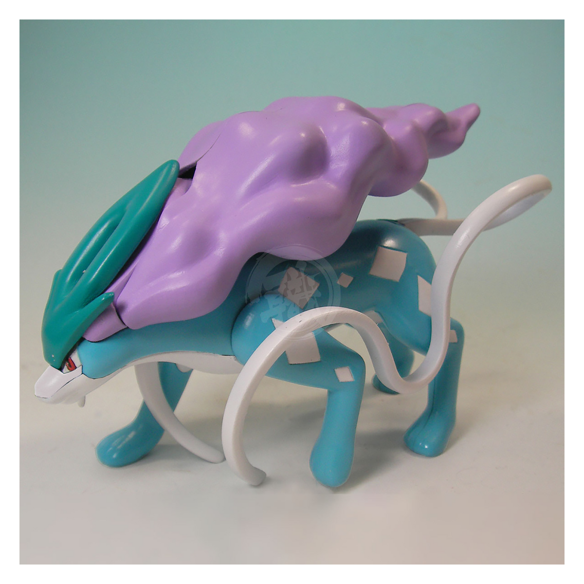 Bandai Pokemon Plamo 09 Suicune model kit featuring detailed plastic parts and vibrant colors, ready for assembly.