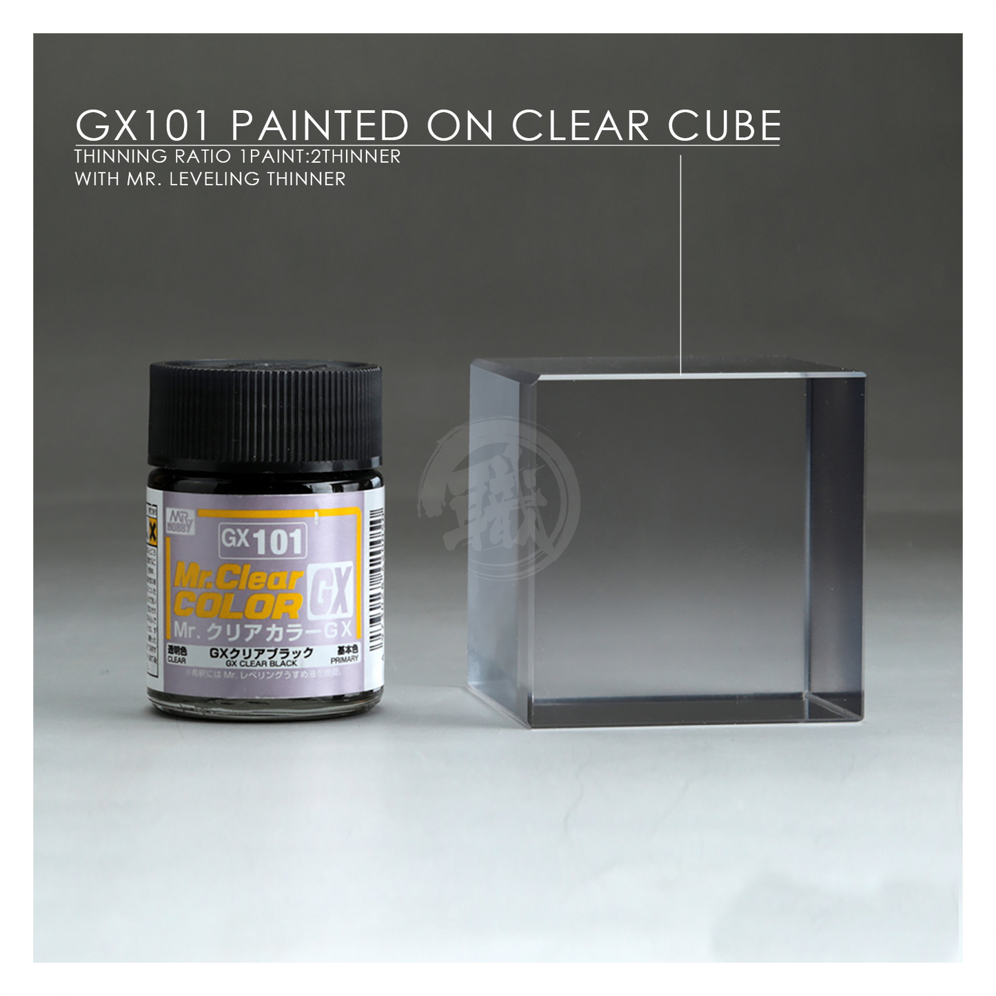 Black paint bottle with GX Clear Black label from GSI Creos, featuring a black cap and clear plastic container.