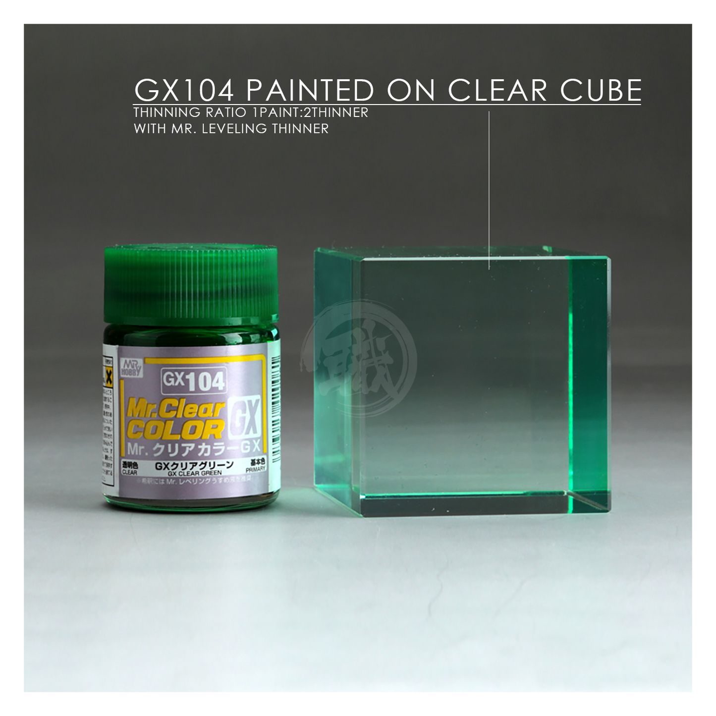 Green paint swatch labeled GX104 GX Clear Green by GSI Creos, showing a vibrant, transparent green color sample.