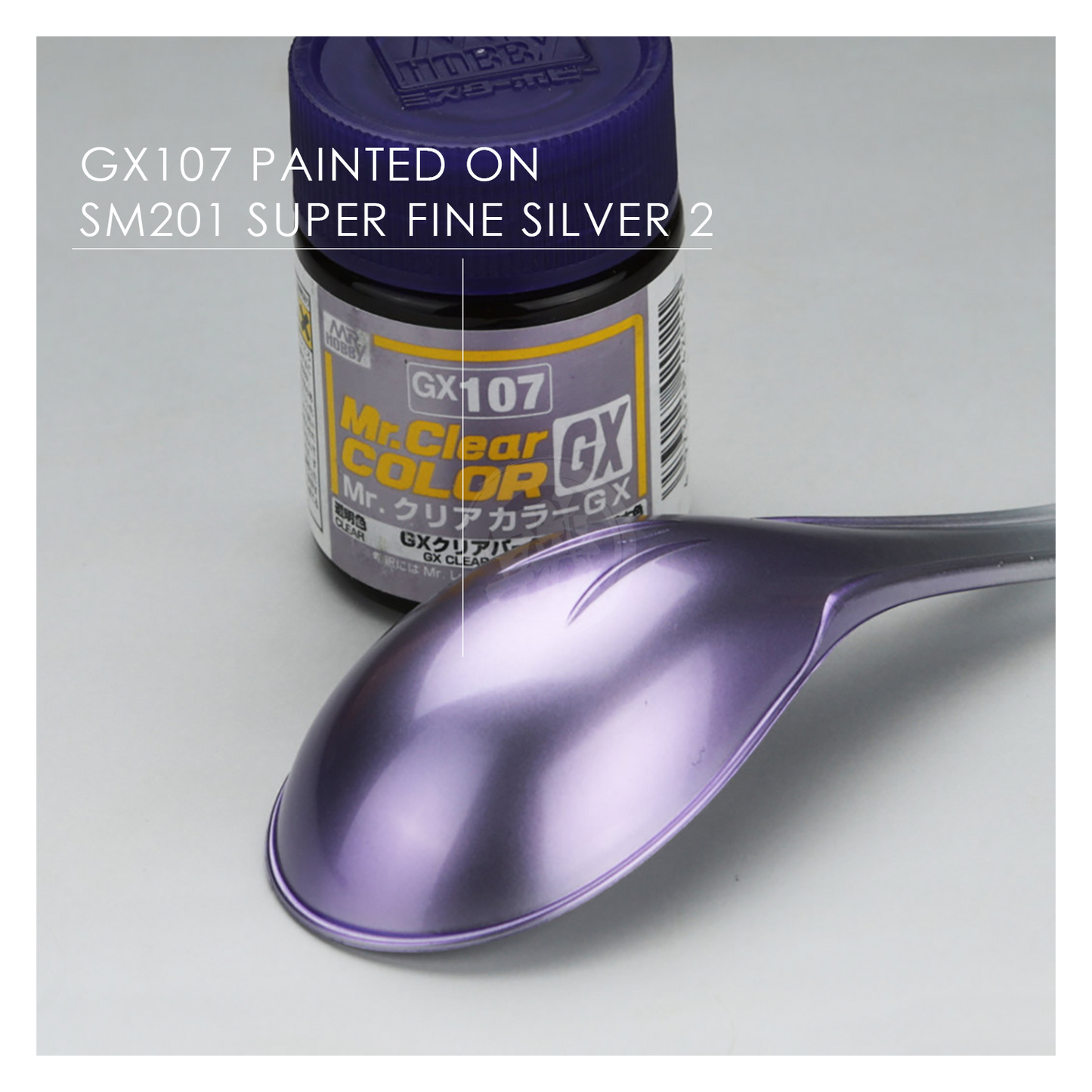 GSI Creos GX Clear Purple paint bottle with purple liquid inside, close-up shot of the GX107 paint product image.