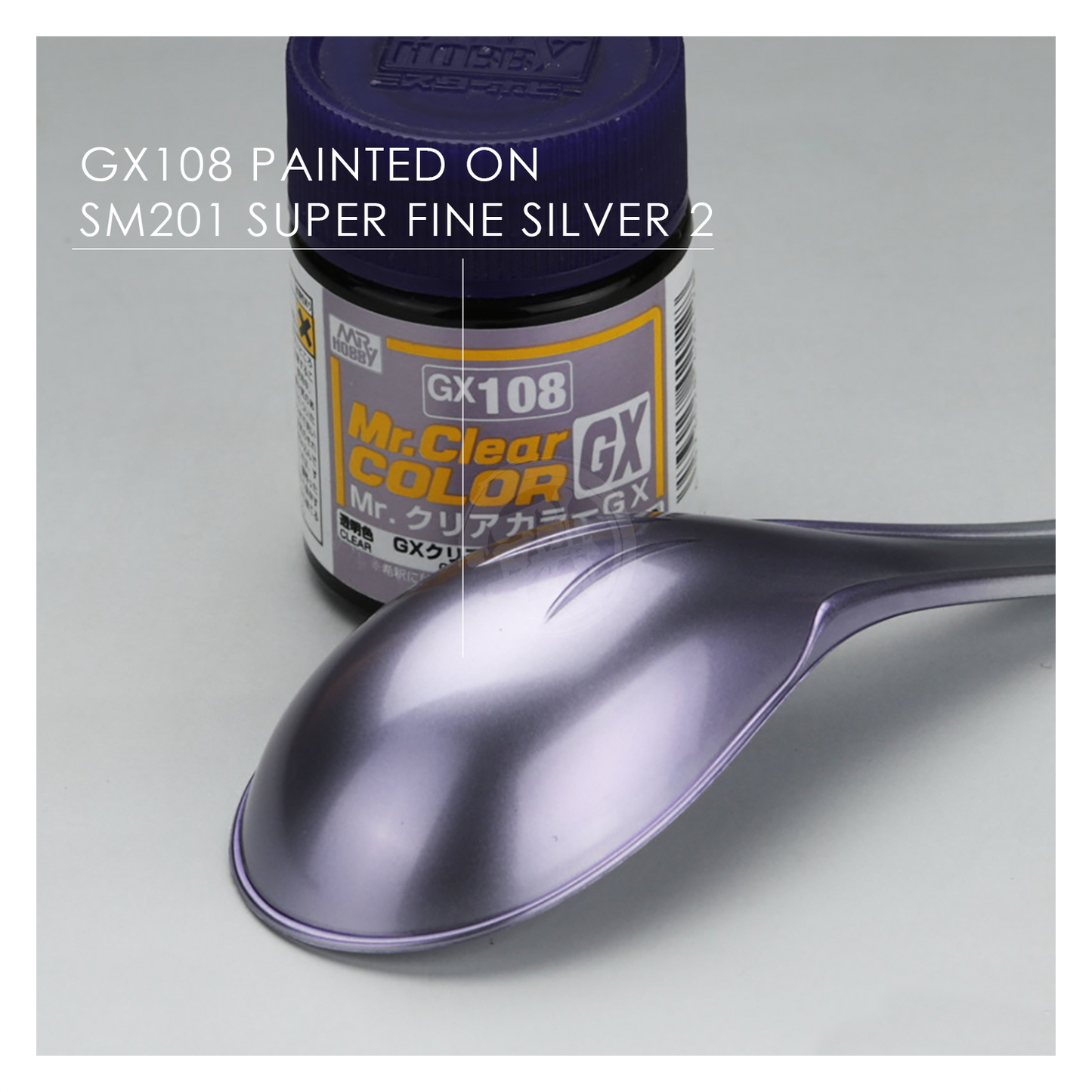 GSI Creos GX108 Clear Violet paint bottle with label, showcasing vibrant purple color and product branding.