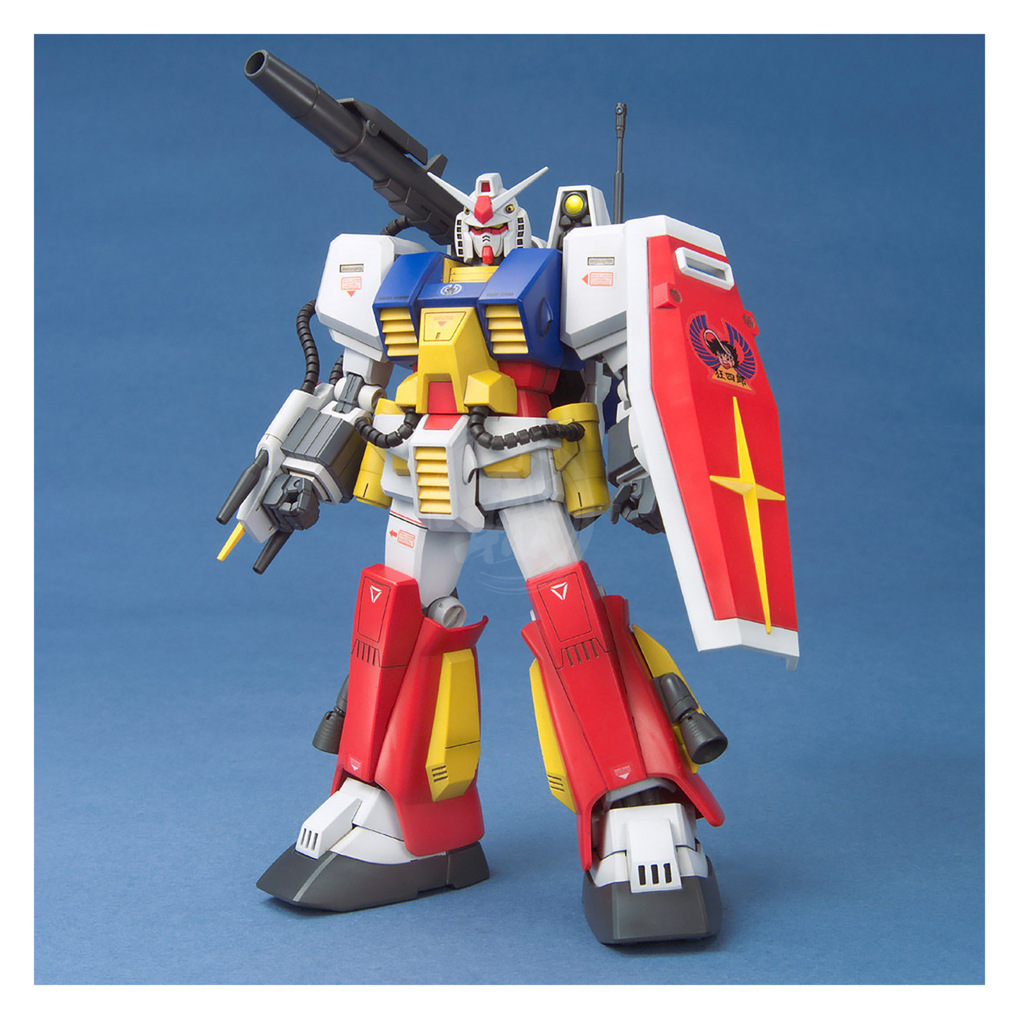 Bandai MG Perfect Gundam model kit in vibrant colors, assembled with detailed armor and weapon accessories, ready for display.