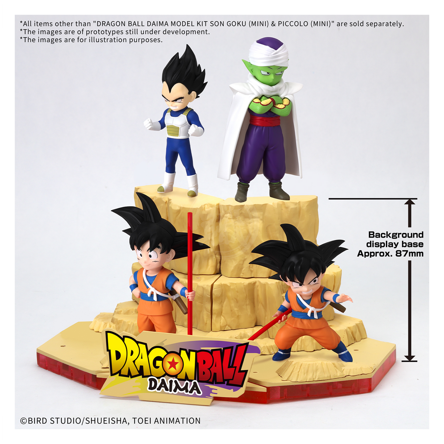 Bandai Dragon Ball Daima model kit featuring mini Son Goku and Piccolo figures on a display stand.