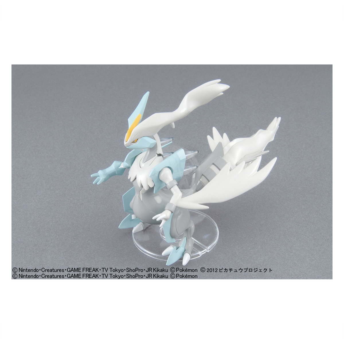 Bandai Pokémon Plamo 28 White Kyurem model kit figure, detailed white dragon with blue accents and intricate design.