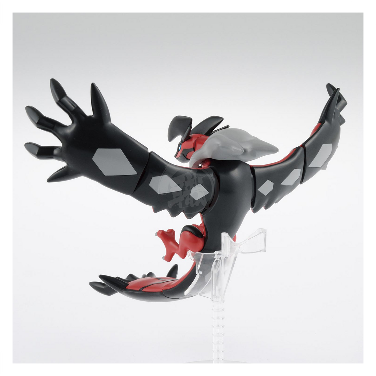 Bandai Pokémon Plamo Yveltal model kit featuring detailed red and black Yveltal figure with wings spread for display.
