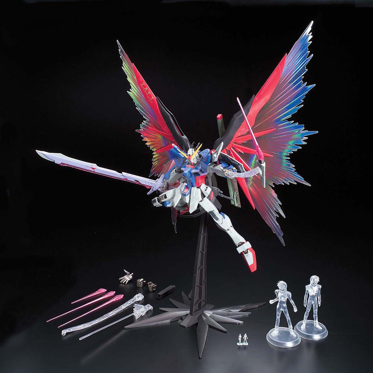 Bandai MG Destiny Gundam model kit in Extreme Burst Mode with detailed armor and weapon accessories.