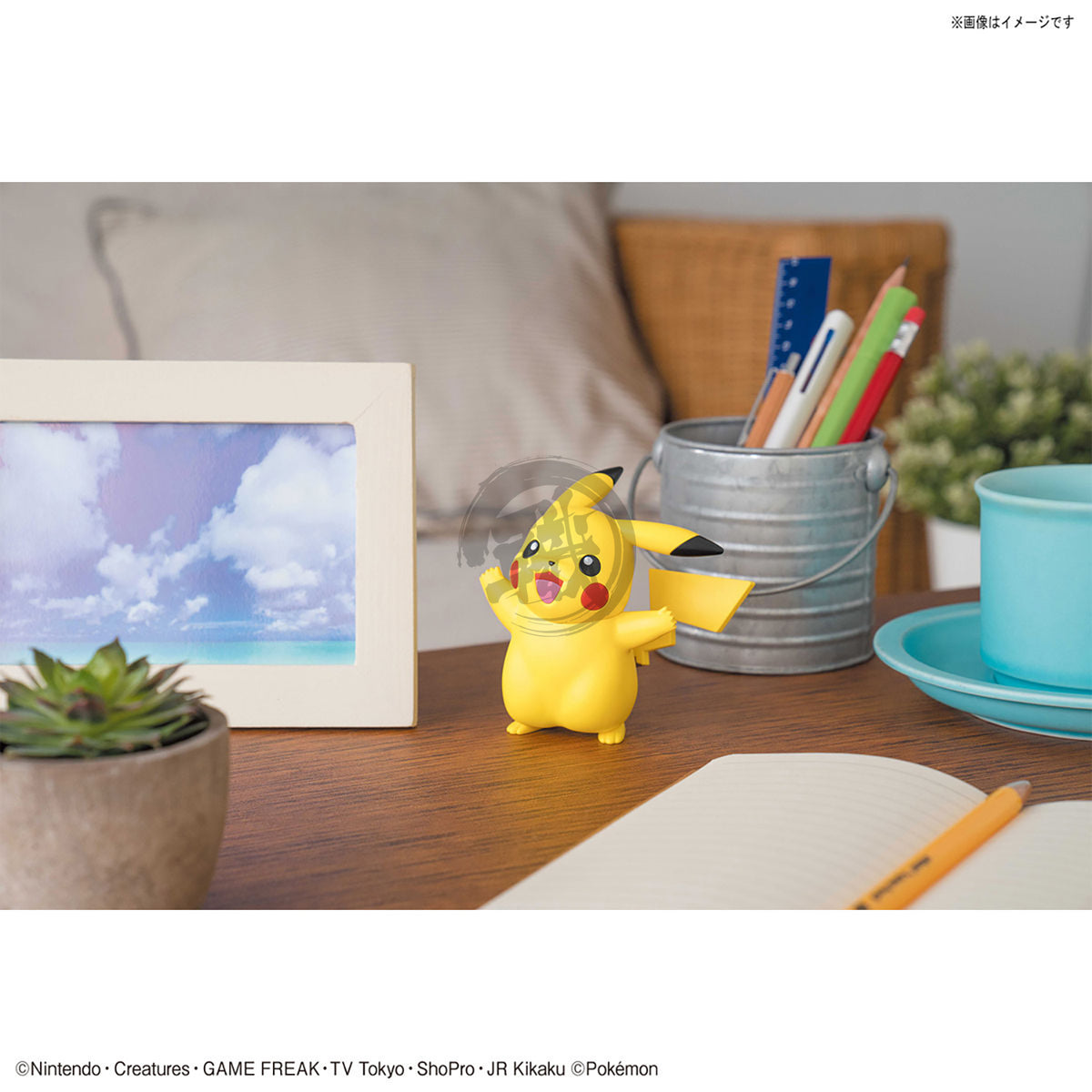 Bandai Pokepla Quick 01 Pikachu model kit figure, detailed yellow Pokémon with red cheeks and black-tipped ears.
