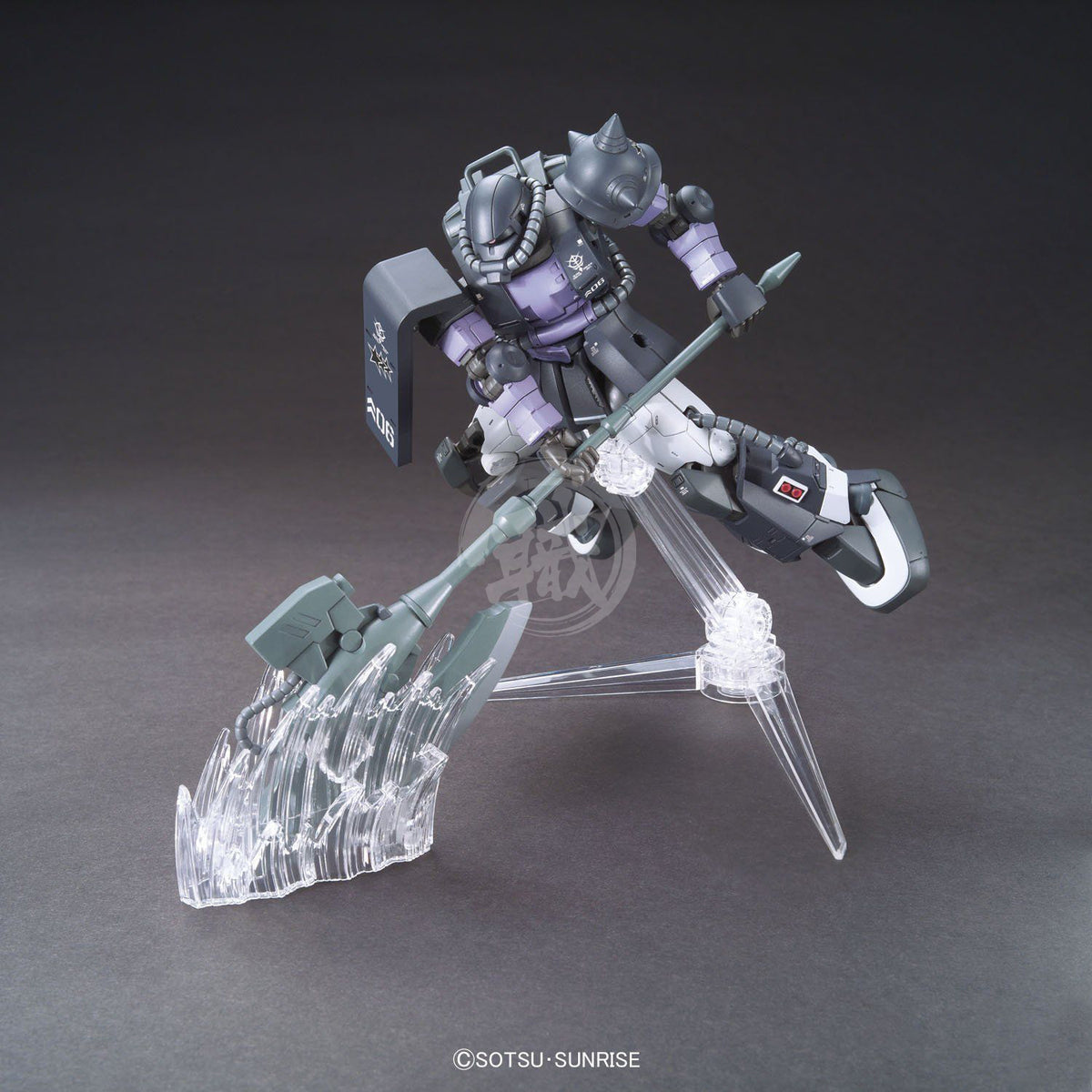 Bandai HG Zaku II High Mobility Type model kit with detailed green and gray plastic parts, displayed on a white background.