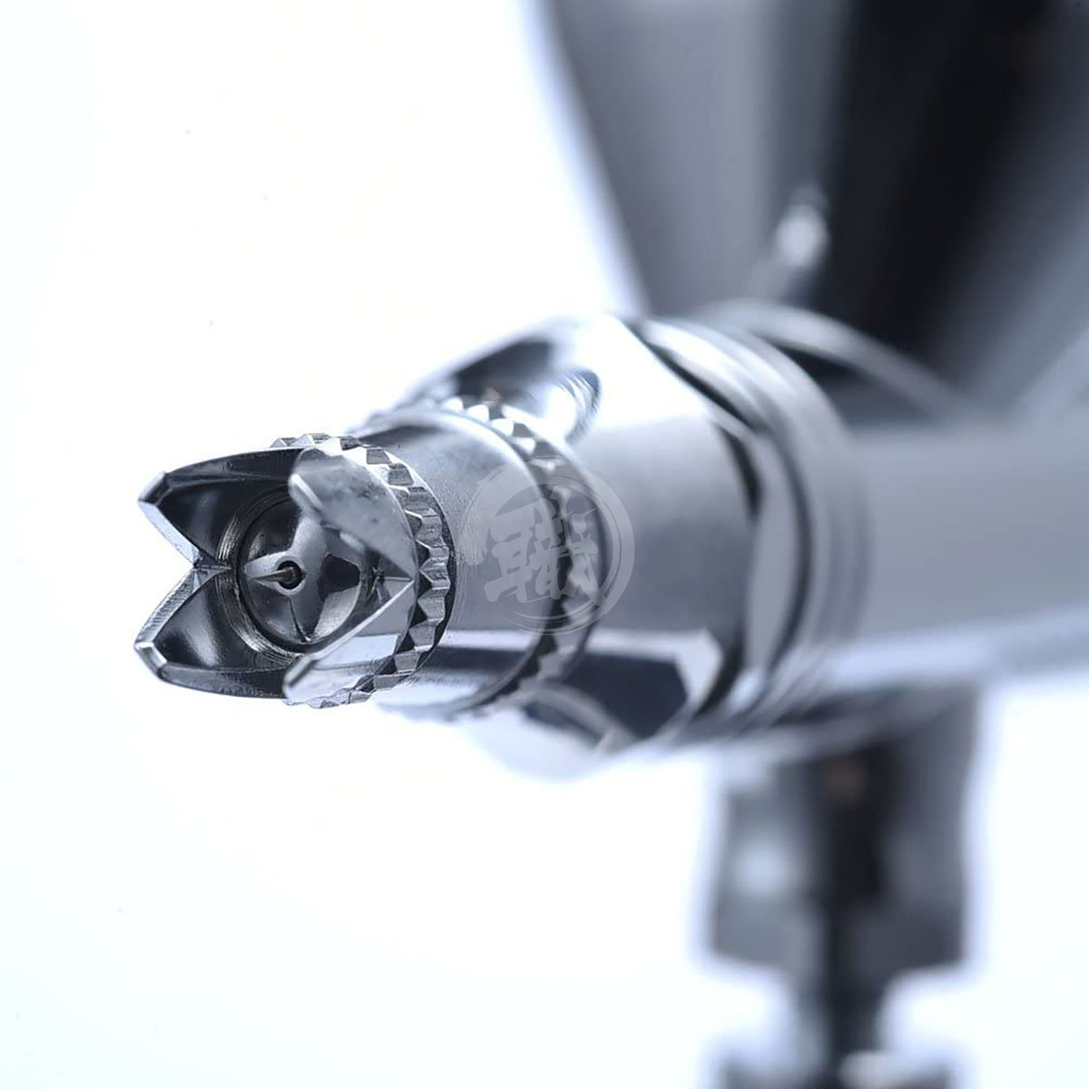 GSI Creos Procon Boy FWA Platinum 0.2 airbrush coloring tool with sleek design and detailed nozzle for precise painting.