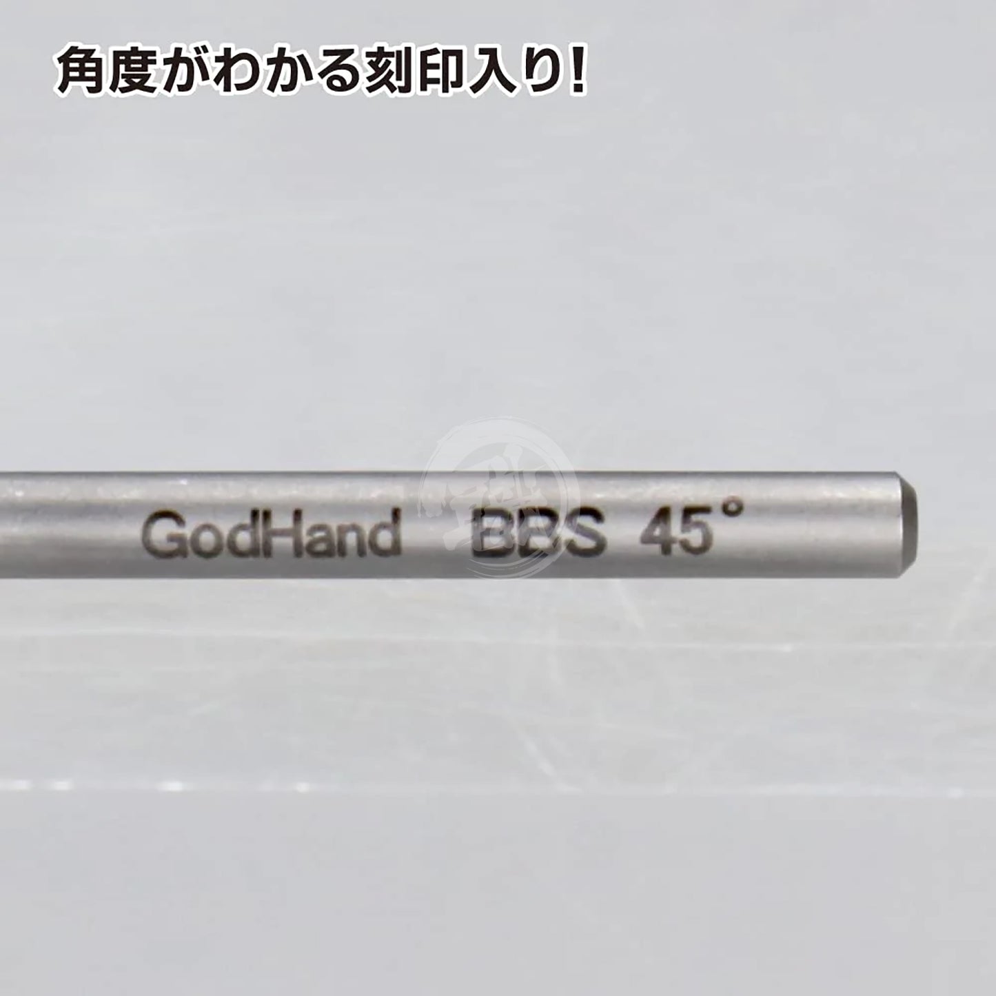 Godhand Tools triangular bit blade set with four orange cutting tools, designed for precision cutting and detailed work.