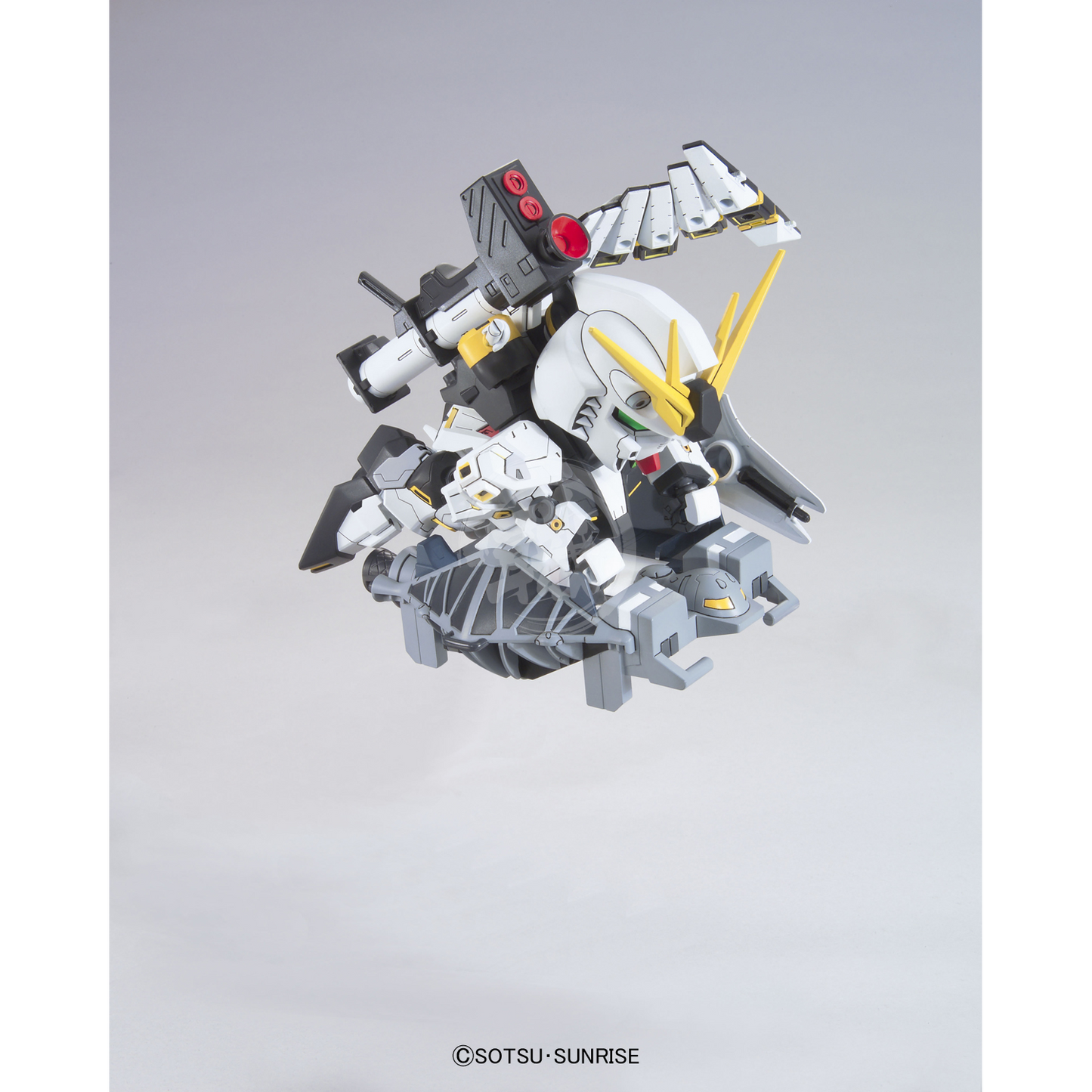 Bandai SD Nu Gundam model kit displayed with detailed plastic parts and assembled figure in a dynamic pose.