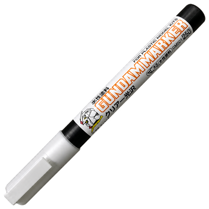 GSI Creos Gundam Marker Clear Gloss coloring tool with transparent cap and label, used for detailing model Gundam figures.