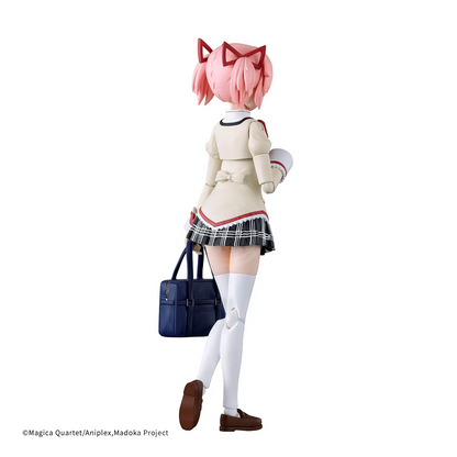 Bandai 30MP Madoka Kaname model kit in school uniform, detailed plastic figure with articulated joints and painted features.