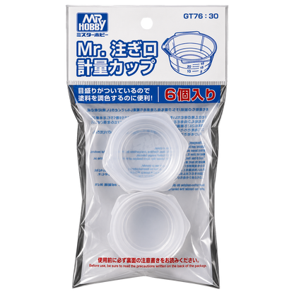 Set of six Mr. Measuring Cups with pourers by GSI Creos, used as coloring tools for precise measurement in model building.