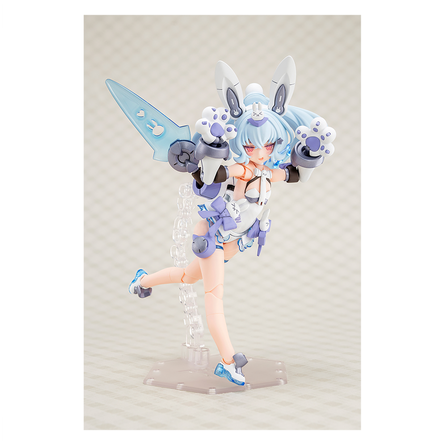 Kotobukiya Puni Mofu Yuki Tu model kit featuring detailed plastic parts and assembled figure with soft, plush-like design.