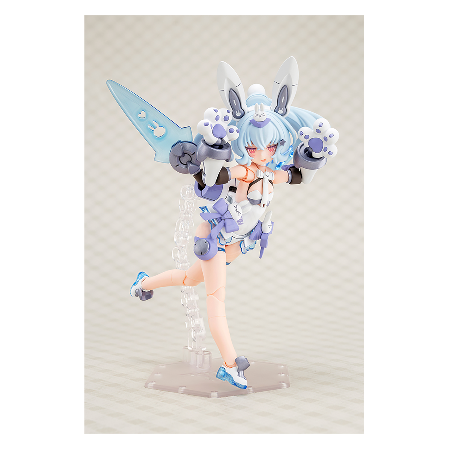 Kotobukiya Puni Mofu Yuki Tu model kit featuring detailed plastic parts and assembled figure with soft, plush-like design.