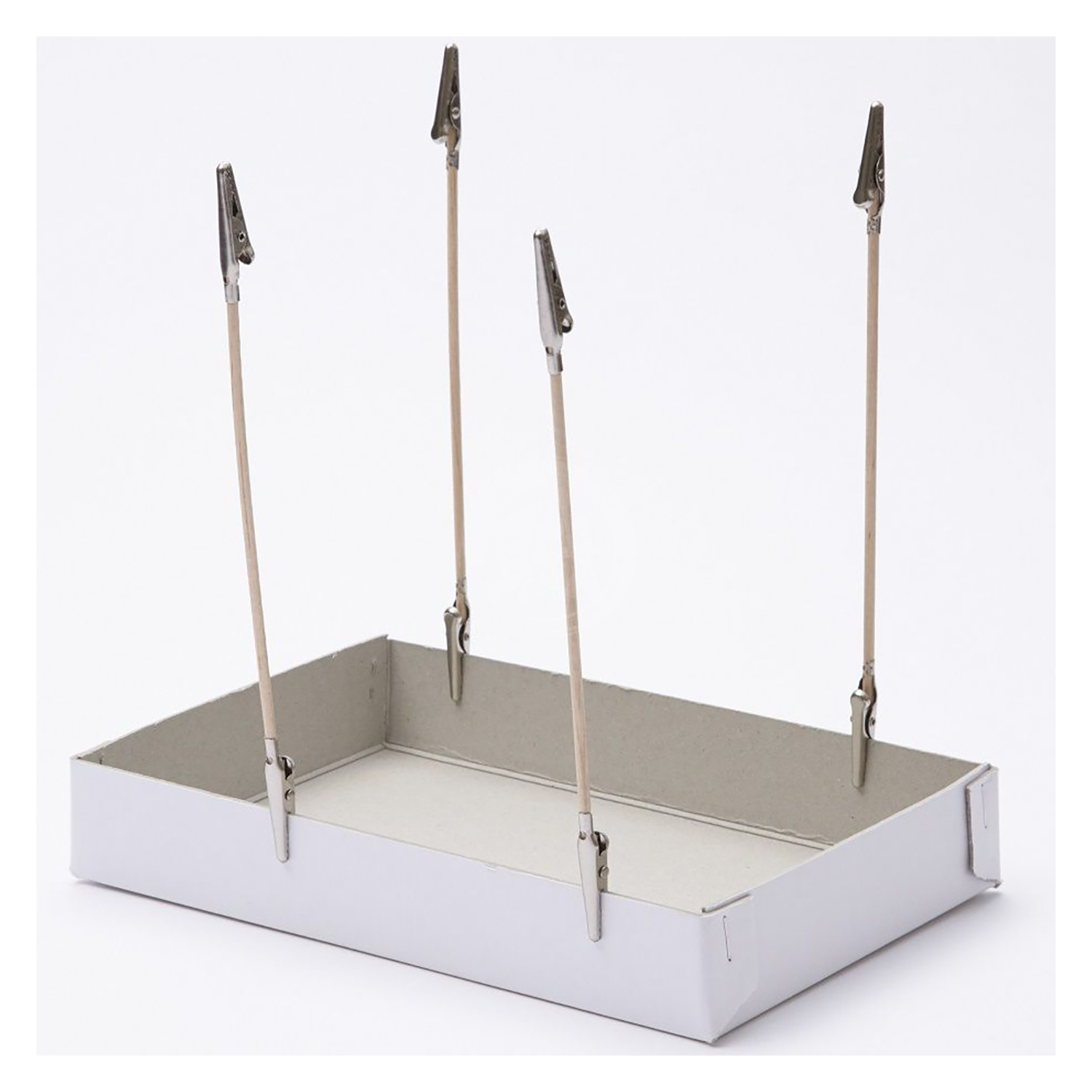 Double-sided Mr. Almighty Clips by GSI Creos for coloring tools, shown holding a small model part in the image.