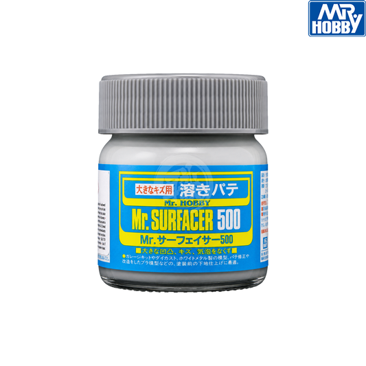 Grey Mr. Surfacer 500 paint by GSI Creos, shown in a bottle with a label and brush for model surface preparation.