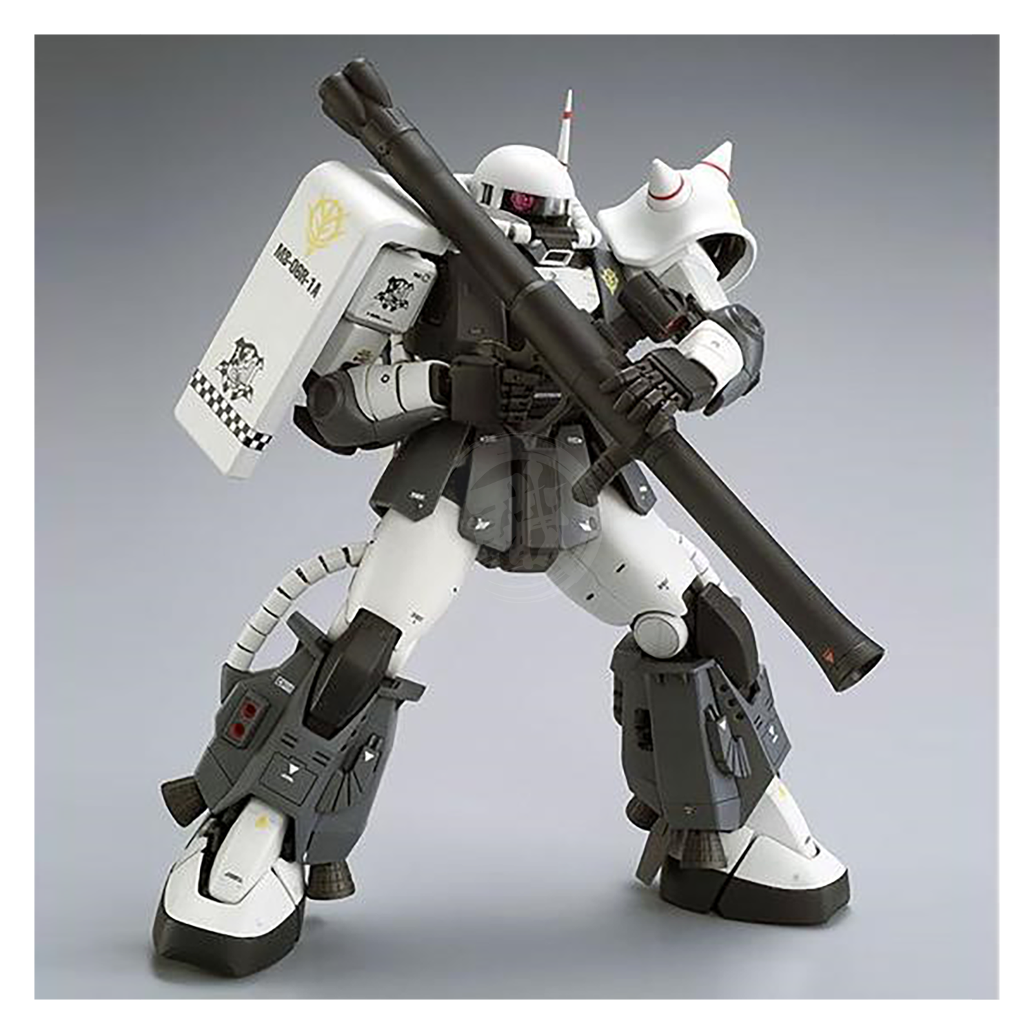 Bandai MG Zaku II High Mobility Type model kit featuring detailed custom design by Eric Manthfield, shown assembled and painted.