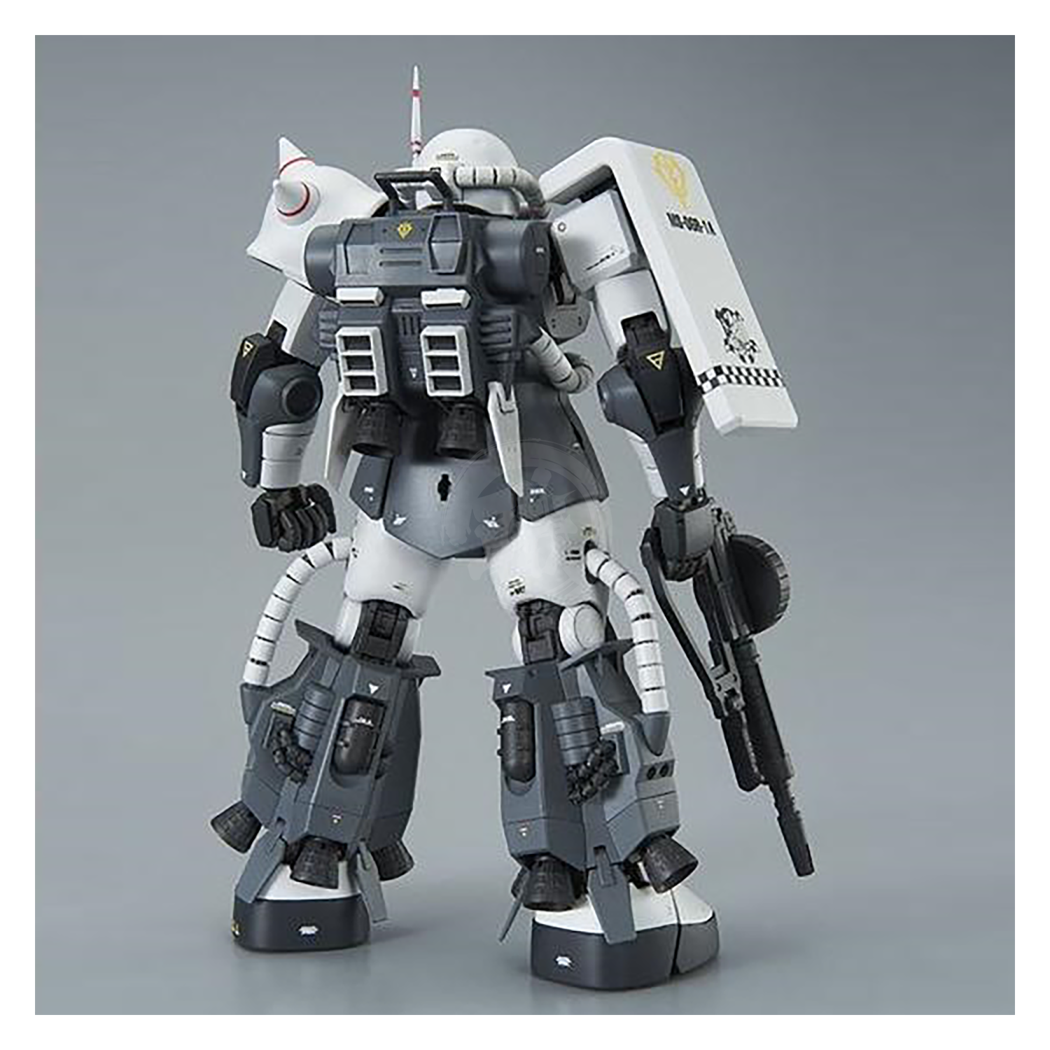 Bandai MG Zaku II High Mobility Type model kit featuring detailed custom paint and articulation, displayed in a dynamic pose.