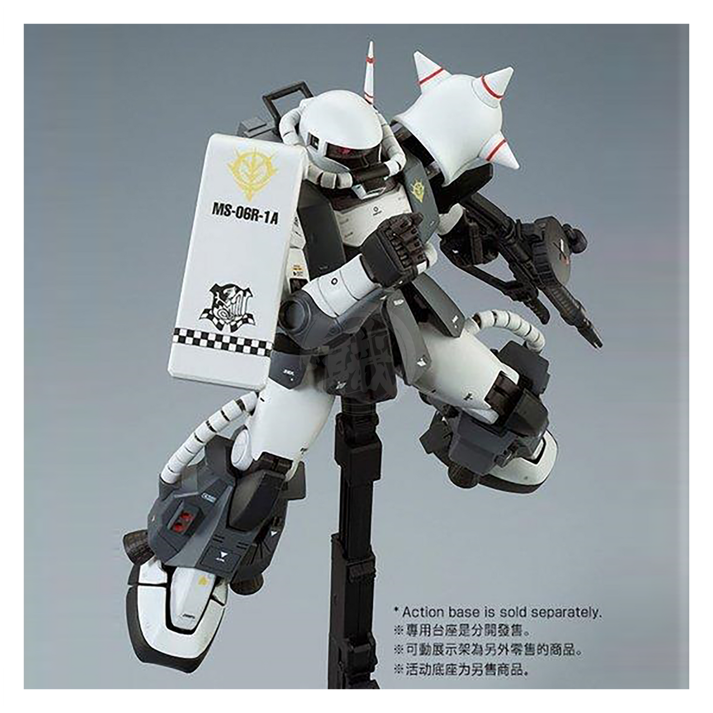 Bandai MG Zaku II High Mobility Type model kit featuring custom paint and detailing by Eric Manthfield, shown assembled with weapons.