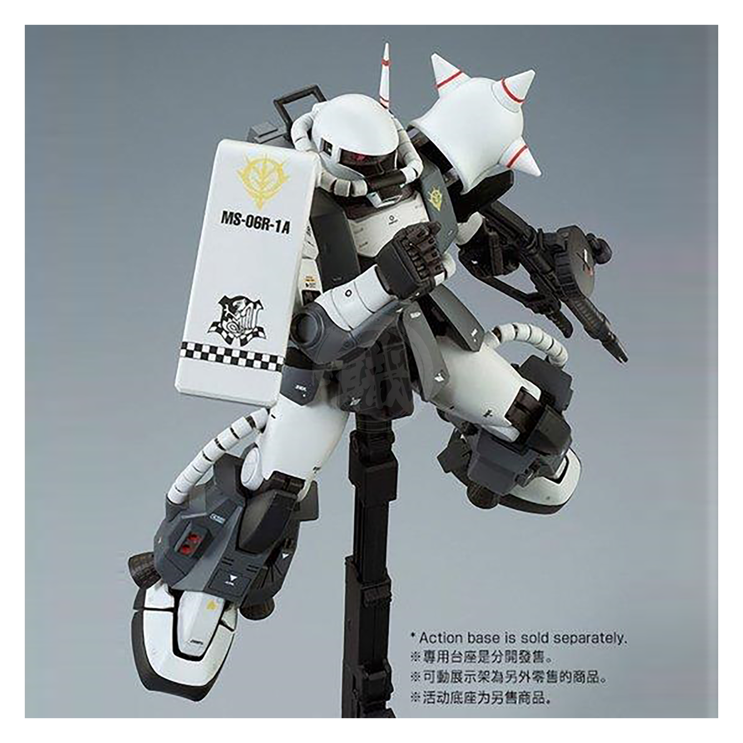 Bandai MG Zaku II High Mobility Type model kit featuring custom paint and detailing by Eric Manthfield, shown assembled with weapons.