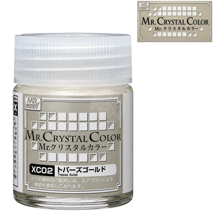 GSI Creos Topaz Gold paint bottle with label, showcasing the vibrant gold-colored paint for models and crafts.